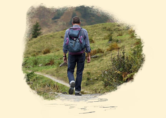 Image of turist walking from the back